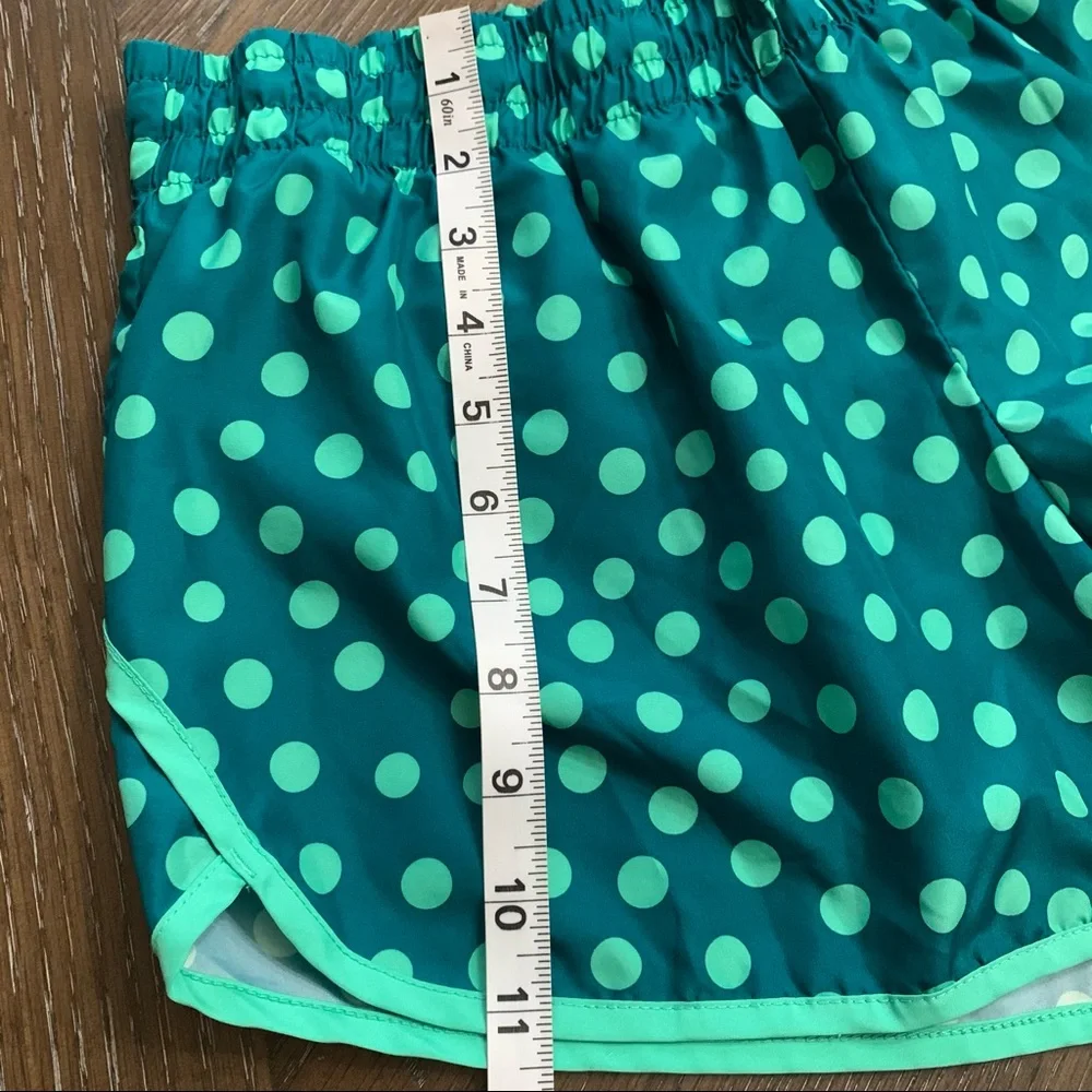 Danskin Now green polka dot athletic shorts Size L